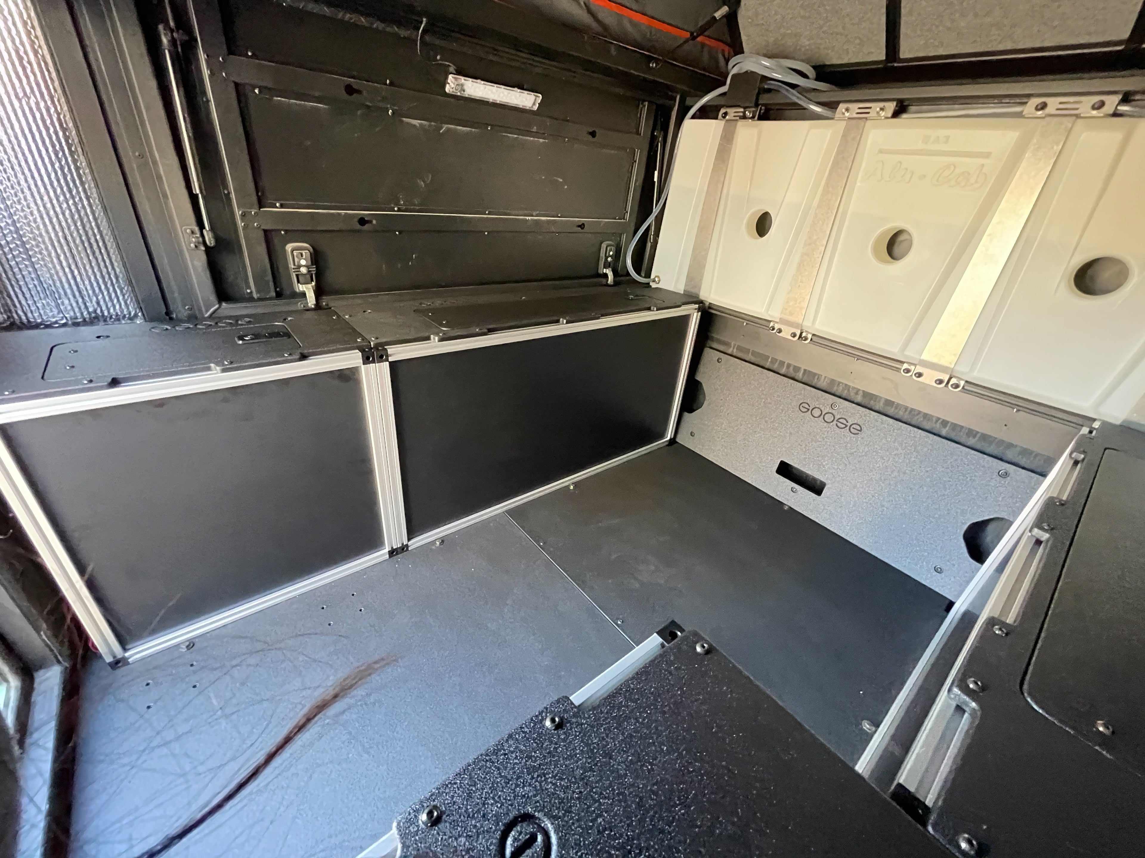 Alu-Cab Canopy Camper V2 - Toyota Tacoma 2005-Present 2nd &amp; 3rd Gen. - Front Utility Module - 6&